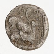 Reverse 'SilCoinCy A7055, Bequest of E.T. Newell, acc.no.: 1944.100.57965. Silver coin of king Baalmilk II of Kition 425 - 400 BC. Weight: 3.51g, Axis: 9h, Diameter: 14mm. Obverse type: Heracles advancing r. holding club and bow. Obverse symbol: -. Obverse legend: - in -. Reverse type: lion devouring stag r. within incuse square. Reverse symbol: -. Reverse legend: [l]b'lm[lk] in Phoenician.