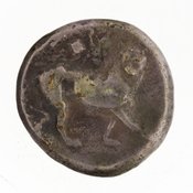 Reverse 'SilCoinCy A7064, E.T. Newell coll., acc.no.: 1944.100.57985. Silver coin of king Uncertain king of Kition of Kition 525 - 480 BC. Weight: 10.47g, Axis: 1h, Diameter: 21mm. Obverse type: Heracles advancing r. holding club and bow. Obverse symbol: -. Obverse legend: - in -. Reverse type: lion advancing r.. Reverse symbol: -. Reverse legend: - in -.