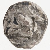 Reverse 'SilCoinCy A7067, Gift of Christian G. Gunther. March 1949, acc.no.: 1951.116.104. Silver coin of king Baalorm of Kition 400 - 392 BC. Weight: 3.16g, Axis: 6h, Diameter: 14mm. Obverse type: Heracles advancing r. holding club and bow. Obverse symbol: -. Obverse legend: - in -. Reverse type: lion devouring stag r. within incuse square. Reverse symbol: -. Reverse legend: [?]bl[?] in Phoenician.