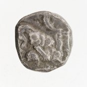 Reverse 'SilCoinCy A7063, Gift of Christian G. Gunther. March 1949, acc.no.: 1951.116.105. Silver coin of king Uncertain king of Kition of Kition 525 - 480 BC. Weight: 10.8g, Axis: 5h, Diameter: 17mm. Obverse type: Heracles advancing r. holding club and bow. Obverse symbol: -. Obverse legend: - in -. Reverse type: lion devouring stag r.. Reverse symbol: -. Reverse legend: not visible in Phoenician.