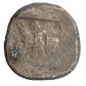 Οπισθότυπος 'SilCoinCy A7141, Gunther, C. Godfrey, acc.no.: 1951.116.116. Silver coin of king Sasmas of Marion 450 BC - . Weight: 10.71g, Axis: 5h, Diameter: 24mm. Obverse type: lion advancing r. licking forepaw, in ex. scroll pattern. Obverse symbol: -. Obverse legend: - in -. Reverse type: Phrixus striding l. beside ram, within incuse square ; double axis on the field l.. Reverse symbol: Double axis. Reverse legend: - in -.