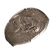 Obverse 'SilCoinCy A7675, acc.no.: 1951.116.125. Silver coin of king Sasmas of Marion 450 BC - . Weight: 11.055999999999999g, Axis: 5h, Diameter: -. Obverse type: lion advancing r. licking forepaw, in ex. scroll pattern. Obverse symbol: -. Obverse legend: sa-sa-ma- in Cypriot syllabic. Reverse type: Phrixus striding l. beside ram, within incuse square. Reverse symbol: Double axis. Reverse legend: - in -.