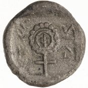 Reverse 'SilCoinCy A7331, Gunther, C. Godfrey, acc.no.: 1951.116.214. Silver coin of king Nikodamos of Salamis 450 BC - . Weight: 1.53g, Axis: 11h, Diameter: 12mm. Obverse type: ram lying l.. Obverse symbol: si-le / ni-ko-ta. Obverse legend: si-le / ni-ko-ta in Cypriot syllabic. Reverse type: ankh within incuse square. Reverse symbol: pa/si-la-ni-ta. Reverse legend: pa / si-la-ni-ta in Cypriot syllabic.