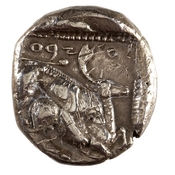 Reverse 'SilCoinCy A7666, acc.no.: 1951.116.77. Silver coin of king Ozibaal of Kition 450 - 425 BC. Weight: 10.916g, Axis: 9h, Diameter: -. Obverse type: Heracles advancing r. holding club and bow. Obverse symbol: -. Obverse legend: - in -. Reverse type: lion devouring stag r. within incuse square. Reverse symbol: -. Reverse legend: l'zb'[l] in Phoenician.