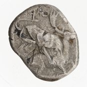 Reverse 'SilCoinCy A7058, Gift of Christian G. Gunther. March 1949, acc.no.: 1951.116.81. Silver coin of king Baalmilk II of Kition 425 - 400 BC. Weight: 10.66g, Axis: 7h, Diameter: 19mm. Obverse type: Heracles advancing r. holding club and bow. Obverse symbol: -. Obverse legend: - in -. Reverse type: lion devouring stag r. within incuse square. Reverse symbol: -. Reverse legend: [lb]'lml[k] in phoenician.