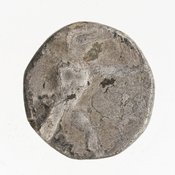 Obverse 'SilCoinCy A7059, Gift of Christian G. Gunther. March 1949, acc.no.: 1951.116.83. Silver coin of king Baalmilk II of Kition 425 - 400 BC. Weight: 10.715g, Axis: 3h, Diameter: 19mm. Obverse type: Heracles advancing r. holding club and bow. Obverse symbol: -. Obverse legend: - in -. Reverse type: lion devouring stag r.. Reverse symbol: -. Reverse legend: [b'lmlk] in Phoenician.
