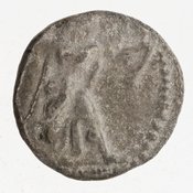 Obverse 'SilCoinCy A7051, Gift of Christian G. Gunther. March 1949, acc.no.: 1951.116.87. Silver coin of king Baalmilk II of Kition 425 - 400 BC. Weight: 3.512g, Axis: 10h, Diameter: 15mm. Obverse type: Heracles advancing r. holding club and bow. Obverse symbol: -. Obverse legend: - in -. Reverse type: lion devouring stag r. within incuse square. Reverse symbol: -. Reverse legend: [l]b'lml[k] in Phoenician.