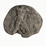 Obverse 'SilCoinCy A7074, Gift of Christian G. Gunther. March 1949, acc.no.: 1951.116.90. Silver coin of king Uncertain king of Kition of Kition 525 - 480 BC. Weight: 1.65g, Axis: 3h, Diameter: 13mm. Obverse type: Heracles advancing r. holding club and bow. Obverse symbol: -. Obverse legend: - in -. Reverse type: lion devouring stag r. within incuse square. Reverse symbol: -. Reverse legend: - in -.