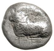 Obverse 'SilCoinCy A7687, acc.no.: 1984.65.103. Silver coin of king Evelthon of Salamis 525 - 500 BC. Weight: 8.69g, Axis: -, Diameter: -. Obverse type: ram lying l.. Obverse symbol: -. Obverse legend: (e-u-we) le-to-ne in Cypriot syllabic. Reverse type: smooth. Reverse symbol: -. Reverse legend: - in -.