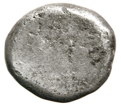 Reverse 'SilCoinCy A7687, acc.no.: 1984.65.103. Silver coin of king Evelthon of Salamis 525 - 500 BC. Weight: 8.69g, Axis: -, Diameter: -. Obverse type: ram lying l.. Obverse symbol: -. Obverse legend: (e-u-we) le-to-ne in Cypriot syllabic. Reverse type: smooth. Reverse symbol: -. Reverse legend: - in -.