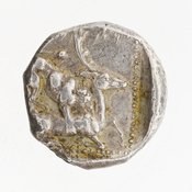 Reverse 'SilCoinCy A7062, Gift of Jonathan Kagan, acc.no.: 1988.18.3. Silver coin of king Baalorm of Kition 400 - 392 BC. Weight: 10.901999999999999g, Axis: 5h, Diameter: 19mm. Obverse type: Heracles advancing r. holding club and bow. Obverse symbol: nice image on the obv.. Obverse legend: - in -. Reverse type: lion devouring stag r. within incuse square. Reverse symbol: nice and clean image on the rev.. Reverse legend: lmlkb in Phoenician.