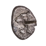 Obverse 'SilCoinCy A7010, Arnold-Peter Weiss, acc.no.: 2004.18.6. Silver coin of king Uncertain king of Kourion of Kourion ?  - . Weight: 11.05g, Axis: 10h, Diameter: 18mm. Obverse type: Roaring lion head to l.. Obverse symbol: -. Obverse legend: - in -. Reverse type: Octopus in incuse square. Reverse symbol: -. Reverse legend: ka in Cypriot syllabic.