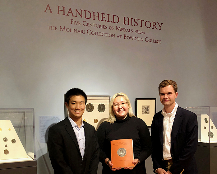 Curators of "A Handheld History" (l. to r.), Benjamin Wu, Amber Orosco, and Stephen Pastoriza.