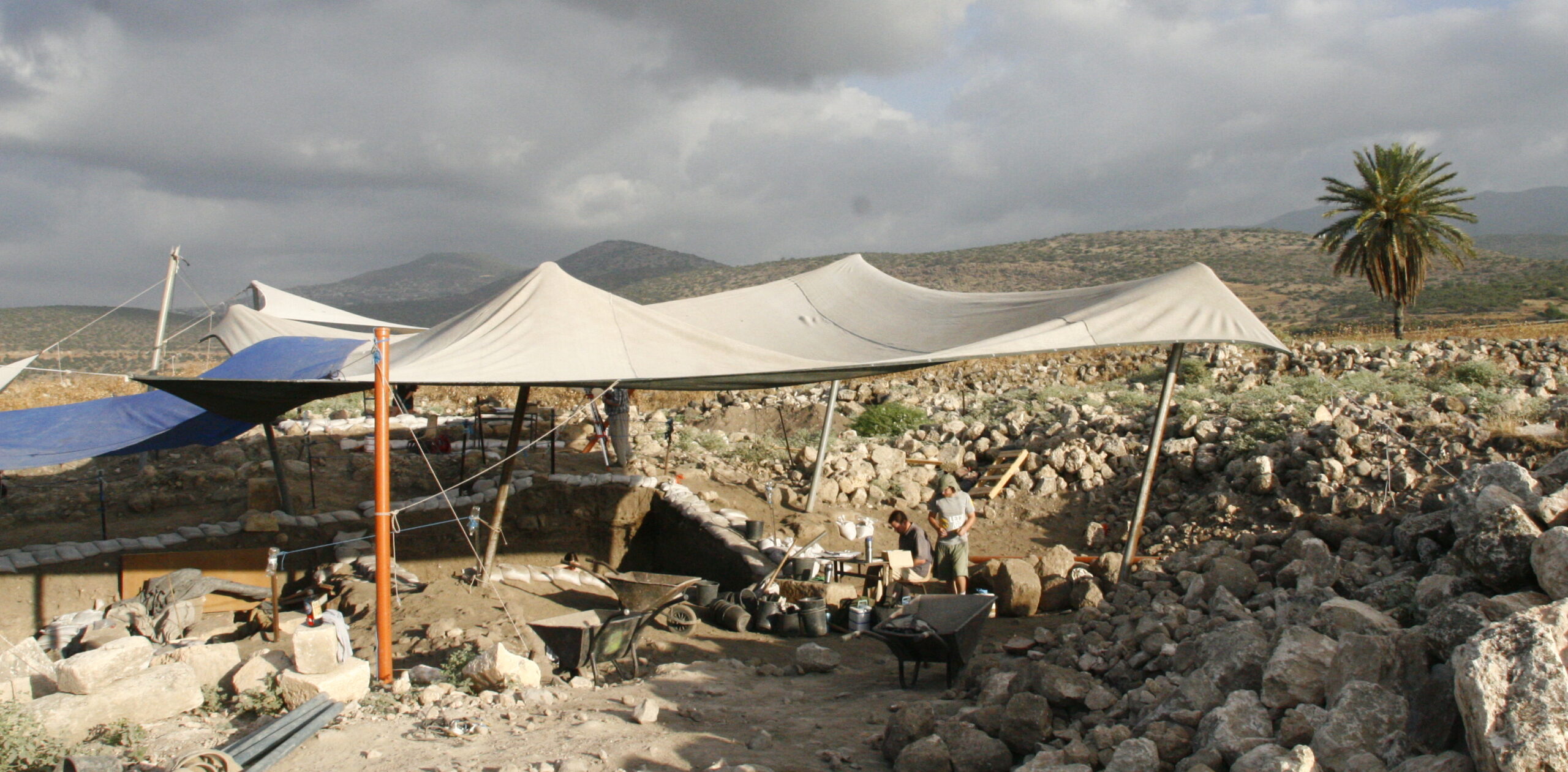 Figure 1. Archaeology is necessarily collaborative and excavation teams include specialists in ancient coins, glass, ceramics, paleobotany, and other specialties. Pictured here is Area 3000 of the Huqoq Excavation Project, where Dr. Elkins is the site’s numismatist. Photo courtesy of Jim Haberman. 