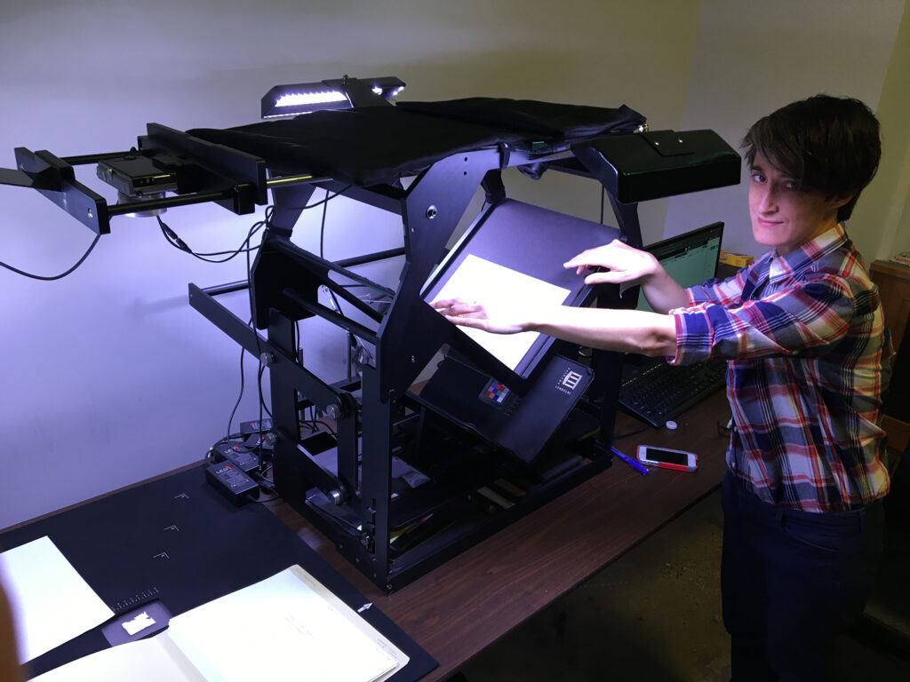 Lara Jacobs scans a book at the ANS