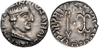 Fig. 2: Nahapāna coin, with transliterated obverse legend ΡΑΝΝΙω ΞΑΗΑΡΑΤΑC ΝΑΗΑΠΑΝΑC (rannio ksaharatas nahapanas, “of king Nahapāna, the Kṣaharata”; mid first century CE) [CNG Auction 369, Lot 24, 24 Feb. 2016]