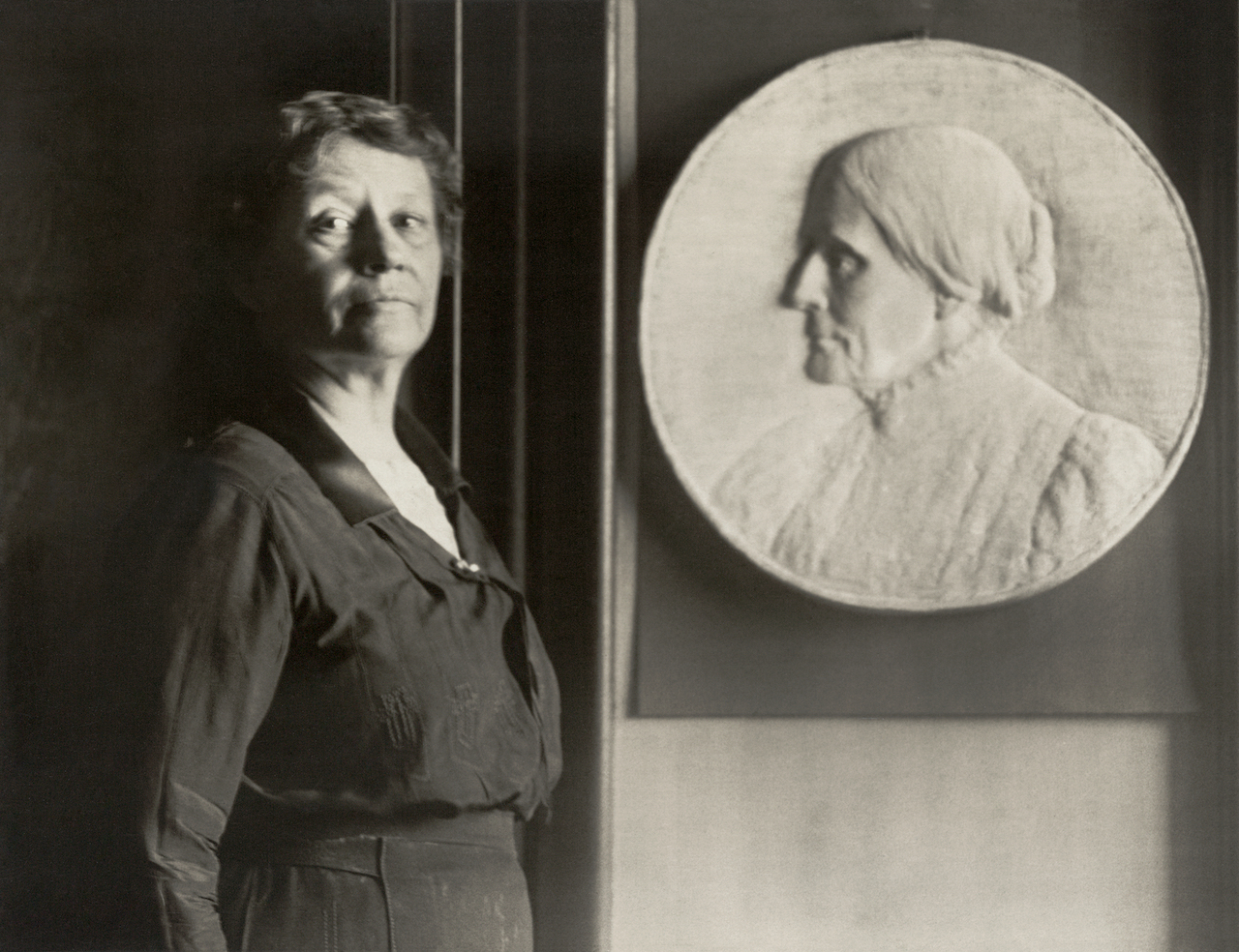 Figure 2: Leila Woodman Usher with bas relief of Susan B. Anthony.